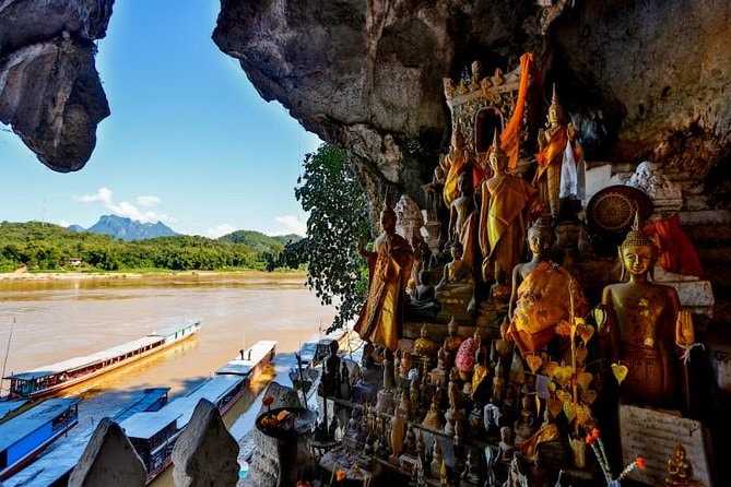 Inside Pak Ou Caves on Laos Cultural Tour Itinerary