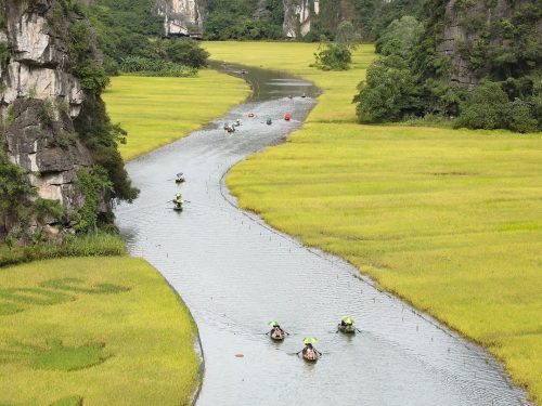 The Best Ninh Binh Day Trip includes a boat ride through Trang An’s limestone caves and stunning natural landscapes.