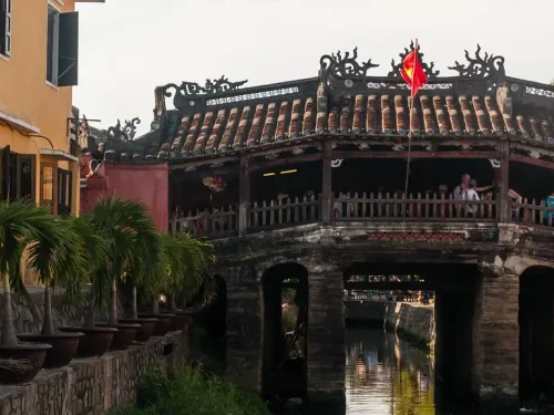 Admire the intricate architecture of Chua Cau (the Pagoda Bridge), a symbol of Hoi An's rich cultural heritage