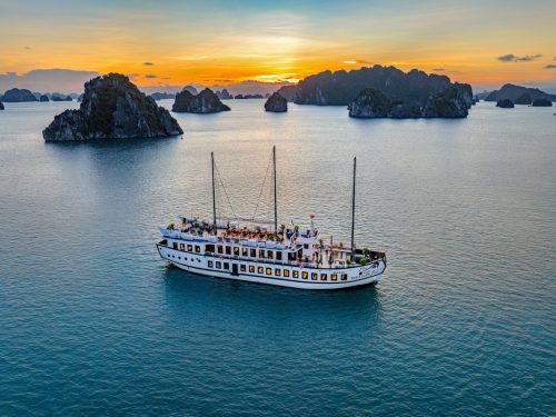Treasure Junk Cruise Bai Tu Long Bay offering elegant travel on tranquil waters with premium onboard experience