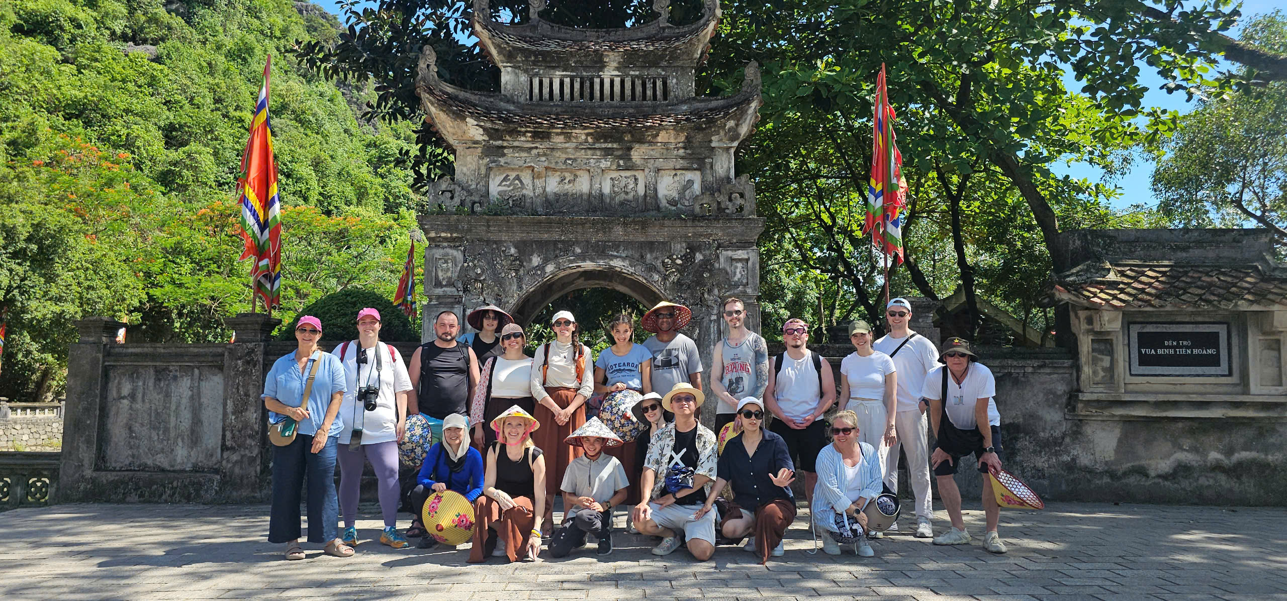 Visitors explore the ancient capital of Hoa Lu during their Ninh Binh Travel journey