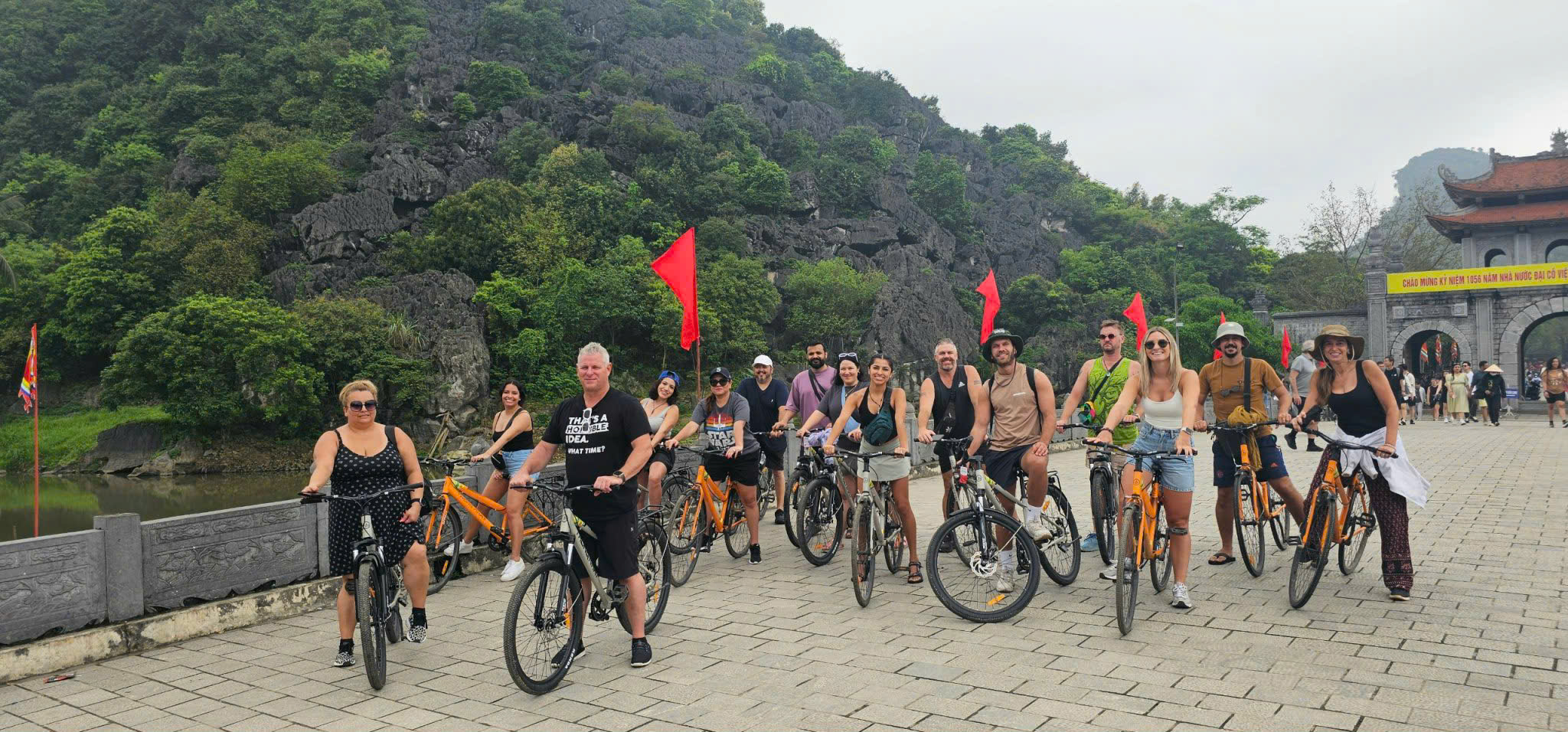 Cycling in Hoa Lu with Ninh Binh Travel, exploring local culture and ancient heritage.