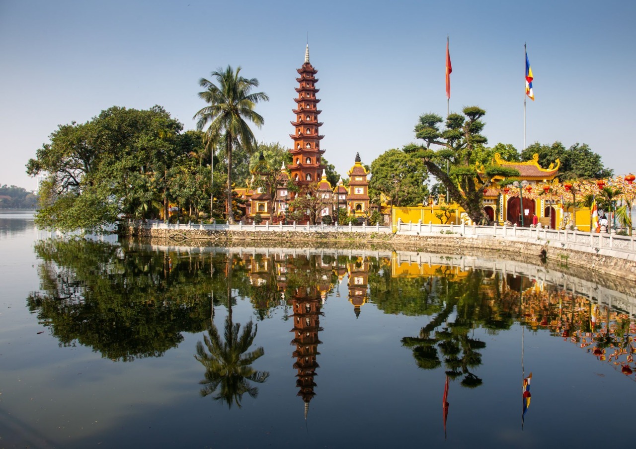 Tran Quoc Pagoda reflected in West Lake, Hanoi, Vietnam
