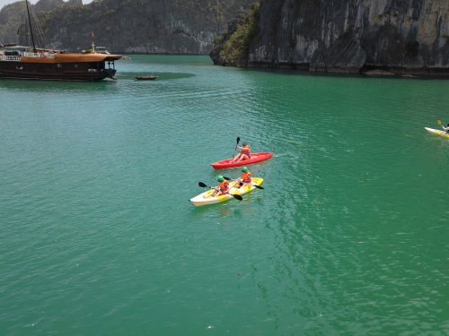 Halong Bay 2 days tour activities like kayaking and cave exploration
