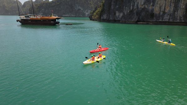 Halong Bay 2 days tour activities like kayaking and cave exploration